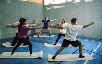 Yogakurs mit Gruppe