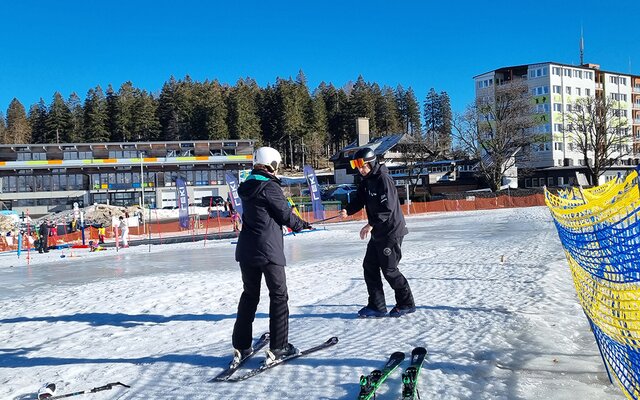 Skikurs auf der Piste